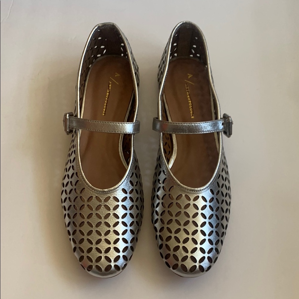 NWB Anthropology Cristal Prada floral cut out in silver. Size 41.